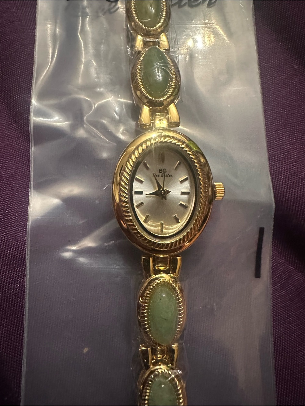Gold-Tone Women’s Bracelet Watch with Green Stone Links